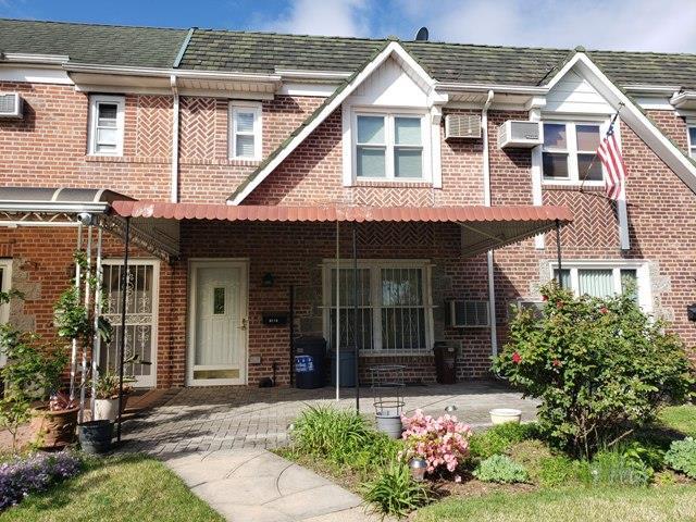 61-16 84th St, Middle Village, NY 11379 - multi unit property featuring brick siding and an AC wall unit