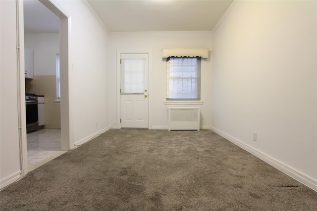 61-16 84th St, Middle Village, NY 11379 - entrance foyer featuring crown molding and carpet floors