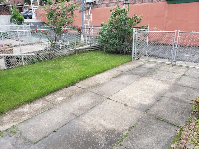 61-16 84th St, Middle Village, NY 11379 - view of yard featuring a gate
