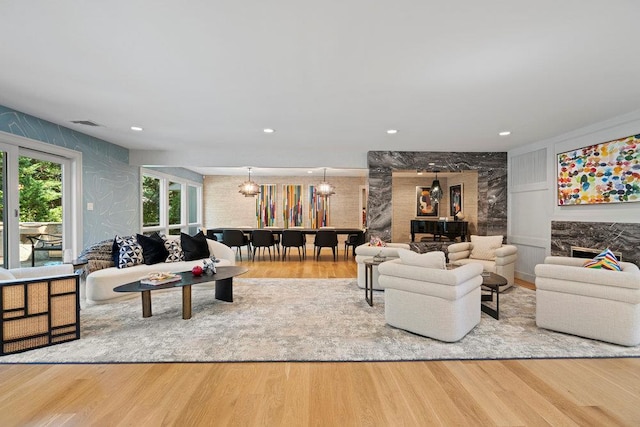 2 Field Ln, Roslyn Heights, NY 11577 - living room with wood finished floors, recessed lighting, and a chandelier