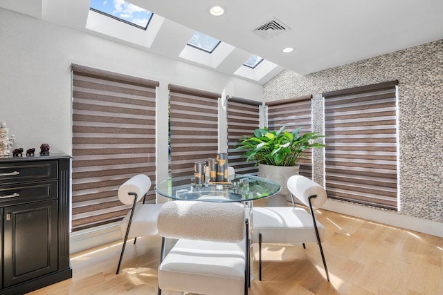 2 Field Ln, Roslyn Heights, NY 11577 - dining space with a skylight, light wood-type flooring, and recessed lighting