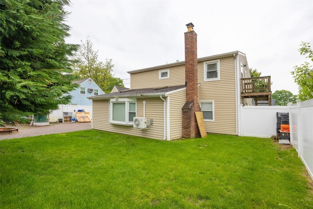 11 Myrtle Ln, Levittown, NY 11756 - rear view of house featuring a chimney and ac unit