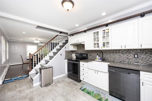 11 Myrtle Ln, Levittown, NY 11756 - kitchen with stainless steel dishwasher, range with electric cooktop, a sink, crown molding, and under cabinet range hood