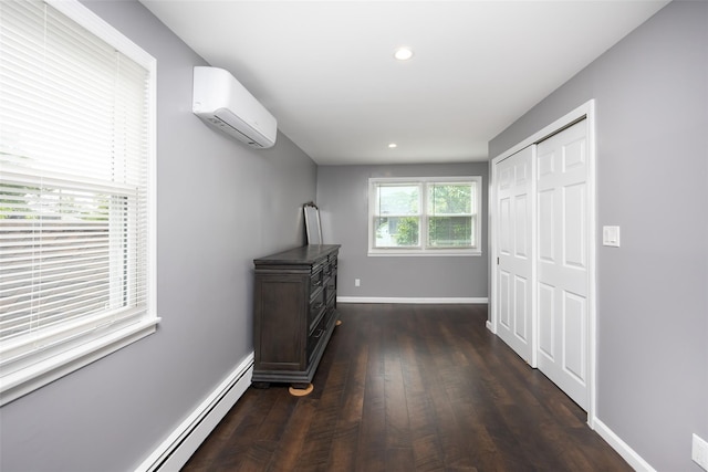 11 Myrtle Ln, Levittown, NY 11756 - hall with a wall unit AC, dark wood-type flooring, recessed lighting, a baseboard radiator, and baseboards