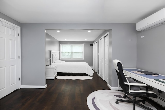 11 Myrtle Ln, Levittown, NY 11756 - bedroom featuring an AC wall unit, wood finished floors, baseboards, recessed lighting, and a desk