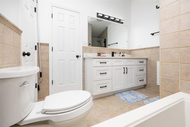 11 Myrtle Ln, Levittown, NY 11756 - bathroom with tile walls, toilet, tile patterned floors, vanity, and wainscoting