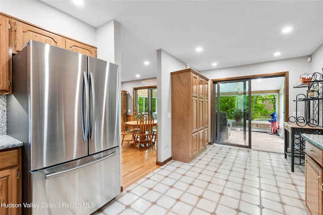 48 Deer Park Rd, Cairo, NY 12473 - kitchen with freestanding refrigerator, recessed lighting, light stone countertops, light floors, and baseboards
