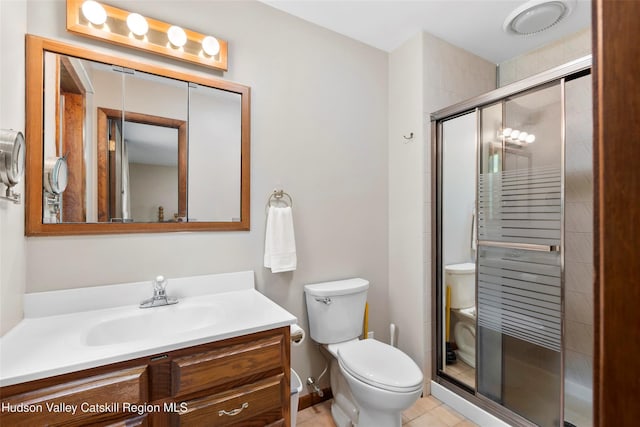 48 Deer Park Rd, Cairo, NY 12473 - bathroom featuring vanity, toilet, a stall shower, and tile patterned flooring
