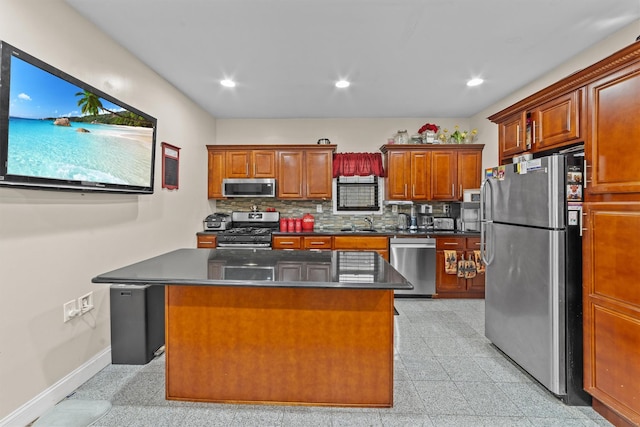 3632 Willett Ave, Bronx, NY 10467 - kitchen featuring stainless steel appliances, granite tiled floors, dark countertops, baseboards, and decorative backsplash