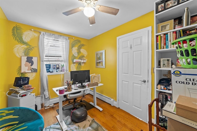 3632 Willett Ave, Bronx, NY 10467 - office space with a ceiling fan, baseboard heating, and wood finished floors