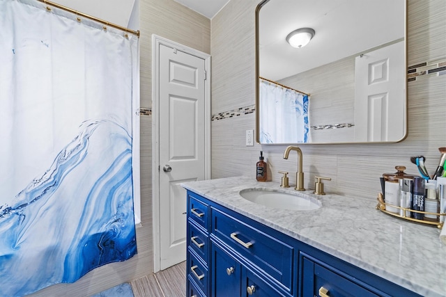 3632 Willett Ave, Bronx, NY 10467 - full bath featuring vanity, tasteful backsplash, a shower with curtain, and tile walls