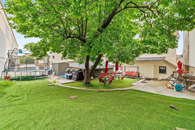 3632 Willett Ave, Bronx, NY 10467 - view of yard featuring a trampoline and a patio
