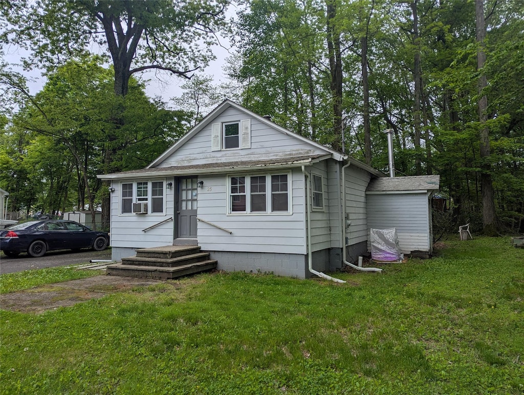 25 Birch St, Pine Bush, NY 12721 - view of front of home featuring a front yard and cooling unit