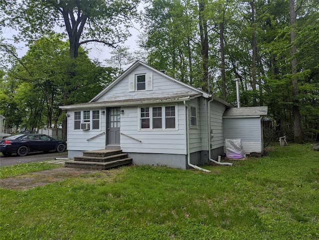 25 Birch St, Pine Bush, NY 12721 - view of front of home featuring a front yard and cooling unit