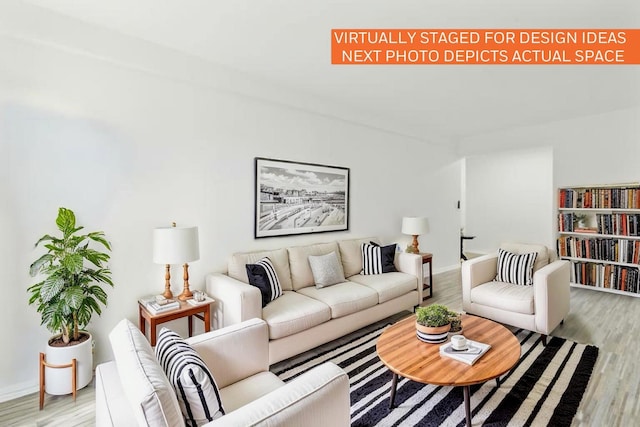 88-09 35th Ave Unit 5K, Jackson Heights, NY 11372 - living area featuring light wood-style floors and baseboards