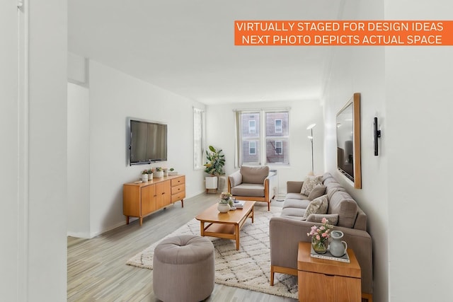 88-09 35th Ave Unit 5K, Jackson Heights, NY 11372 - living room with wood finished floors and baseboards