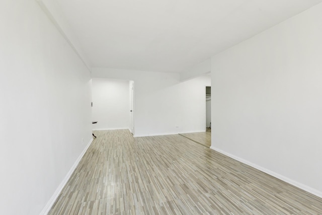88-09 35th Ave Unit 5K, Jackson Heights, NY 11372 - empty room featuring light wood-style floors and baseboards