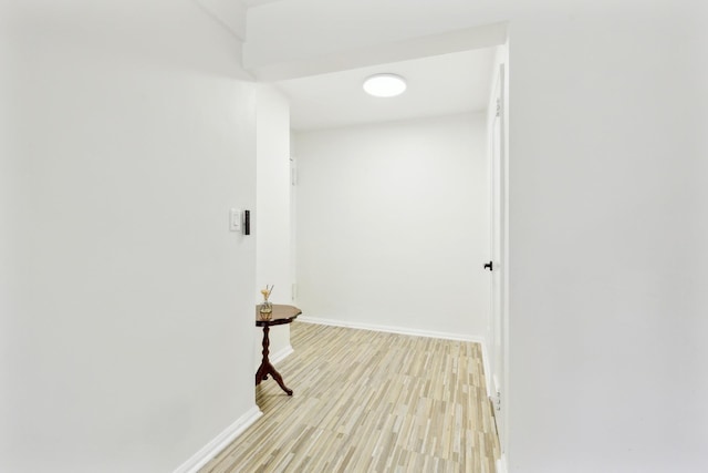 88-09 35th Ave Unit 5K, Jackson Heights, NY 11372 - corridor with baseboards and light wood finished floors