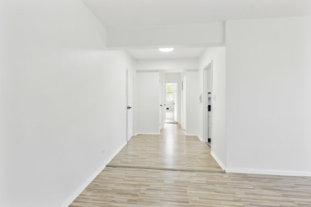 88-09 35th Ave Unit 5K, Jackson Heights, NY 11372 - hallway featuring light wood-style floors and baseboards