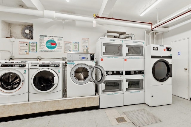 88-09 35th Ave Unit 5K, Jackson Heights, NY 11372 - community laundry featuring independent washer and dryer and stacked washer / drying machine