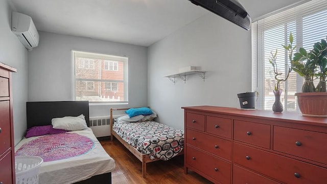 3217 Tenbroeck Ave, Bronx, NY 10469 - bedroom with an AC wall unit, wood finished floors, and multiple windows
