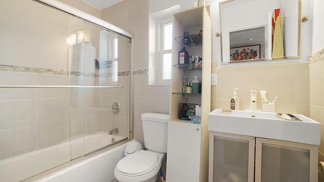 3217 Tenbroeck Ave, Bronx, NY 10469 - full bathroom featuring toilet, vanity, and combined bath / shower with glass door