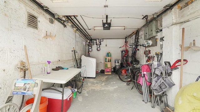 3217 Tenbroeck Ave, Bronx, NY 10469 - garage with washer / clothes dryer and a garage door opener
