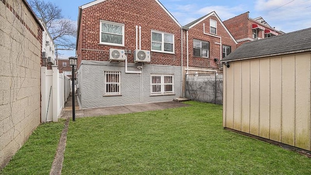 3217 Tenbroeck Ave, Bronx, NY 10469 - rear view of house with brick siding and a cooling unit