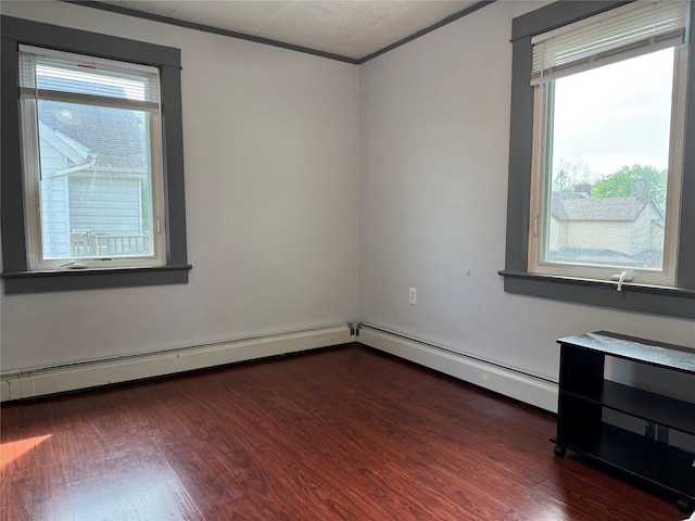 39 Crescent Pl, Middletown, NY 10940 - unfurnished room with dark wood-style floors, a baseboard radiator, and crown molding