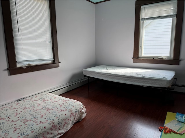 39 Crescent Pl, Middletown, NY 10940 - bedroom with wood finished floors and a baseboard radiator