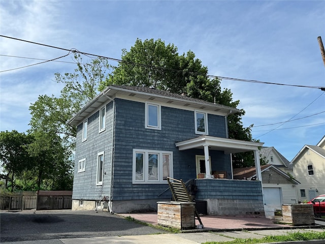 39 Crescent Pl, Middletown, NY 10940 - american foursquare style home featuring covered porch and asphalt driveway