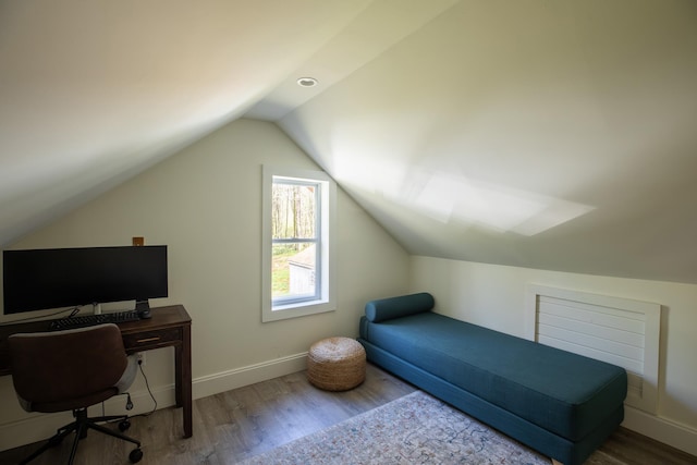 235 Terwilliger Rd, Livingston Manor, NY 12758 - bedroom with wood finished floors, vaulted ceiling, baseboards, and a desk