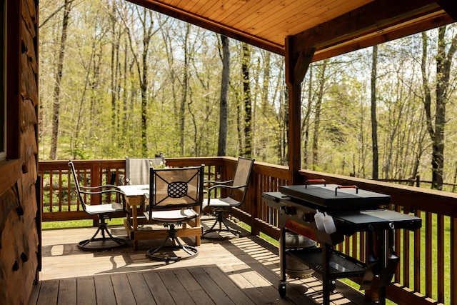 235 Terwilliger Rd, Livingston Manor, NY 12758 - deck with outdoor dining space and a forest view