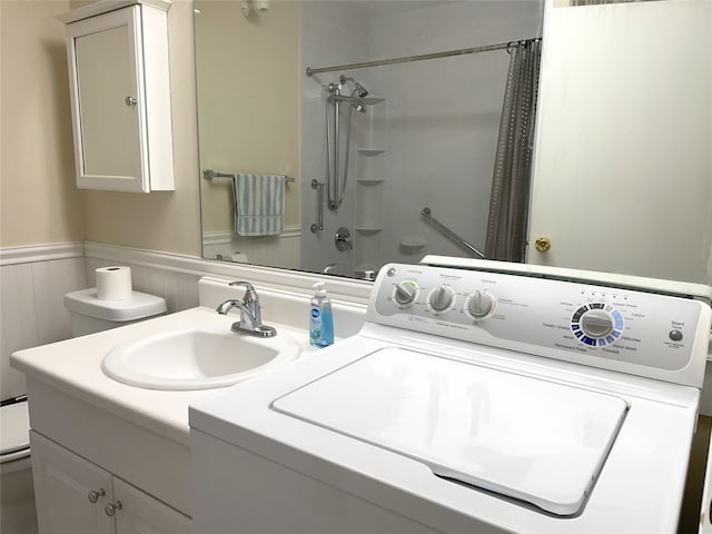 6DEVONCOURT Devon Unit B, Yorktown Heights, NY 10598 - washroom featuring washer / dryer and wainscoting