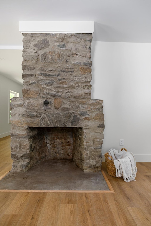 300 Seminary Hill Rd, Carmel, NY 10512 - detailed view of a stone fireplace, wood finished floors, and baseboards