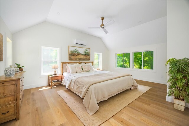 300 Seminary Hill Rd, Carmel, NY 10512 - bedroom with lofted ceiling, a wall mounted air conditioner, light wood-style flooring, ceiling fan, and baseboards