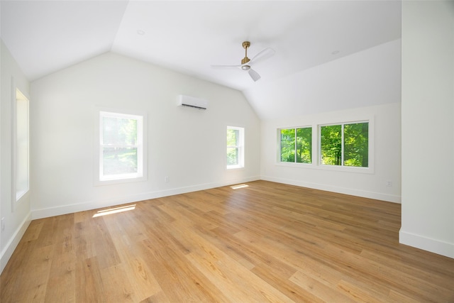 300 Seminary Hill Rd, Carmel, NY 10512 - empty room with vaulted ceiling, an AC wall unit, ceiling fan, light wood-type flooring, and baseboards