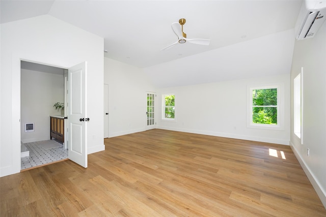 300 Seminary Hill Rd, Carmel, NY 10512 - spare room featuring a wall mounted air conditioner, light wood finished floors, a ceiling fan, baseboards, and high vaulted ceiling