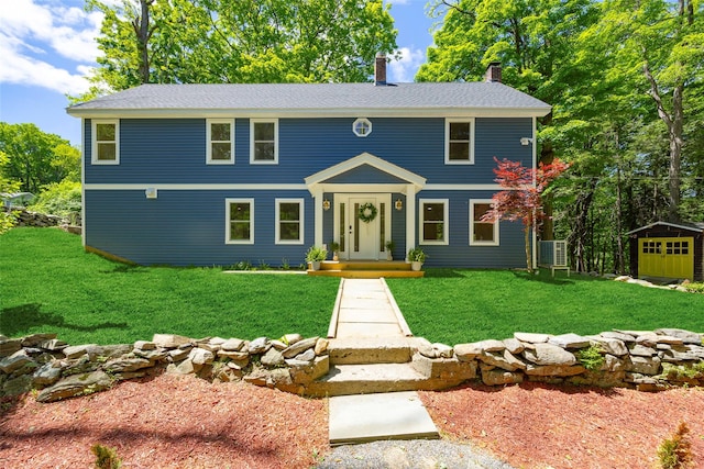 300 Seminary Hill Rd, Carmel, NY 10512 - colonial home featuring cooling unit, a chimney, and a front lawn
