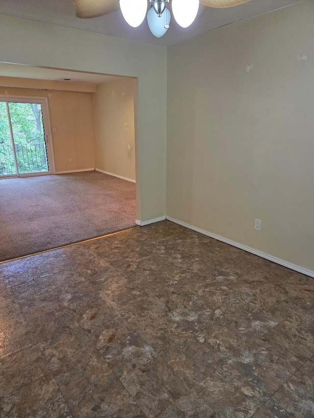 8 Cedar Ct Unit 8, Selden, NY 11784 - spare room with baseboards and a chandelier