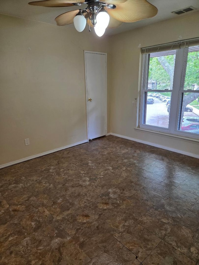 8 Cedar Ct Unit 8, Selden, NY 11784 - unfurnished room with ceiling fan and baseboards
