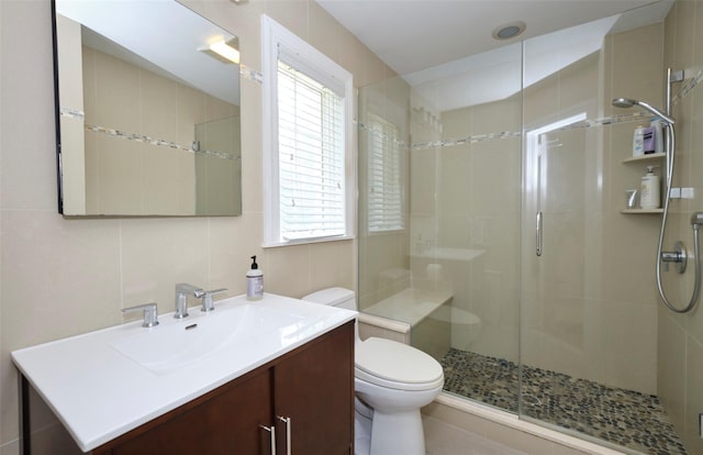 21 Deepdale Dr, Manhasset, NY 11030 - bathroom with a stall shower, vanity, toilet, and healthy amount of natural light