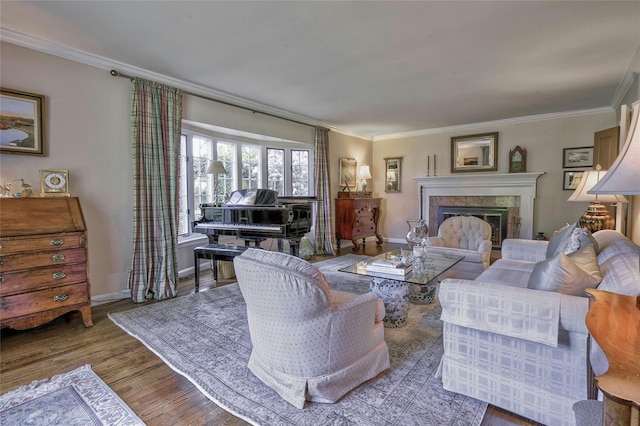 28 Valley Rd, Manhasset, NY 11030 - living area with ornamental molding, wood finished floors, a glass covered fireplace, and baseboards