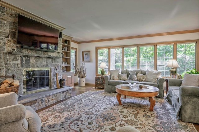 28 Valley Rd, Manhasset, NY 11030 - living room with crown molding, wood finished floors, baseboards, and a fireplace