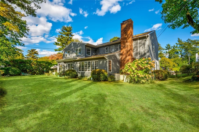 28 Valley Rd, Manhasset, NY 11030 - back of property with a chimney