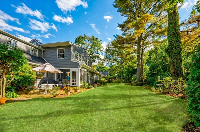 28 Valley Rd, Manhasset, NY 11030 - view of green lawn with a patio area
