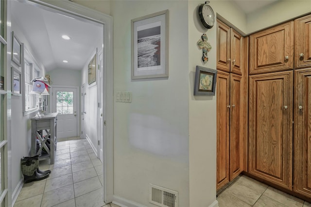 28 Valley Rd, Manhasset, NY 11030 - hall featuring light tile patterned floors, lofted ceiling, baseboards, and recessed lighting