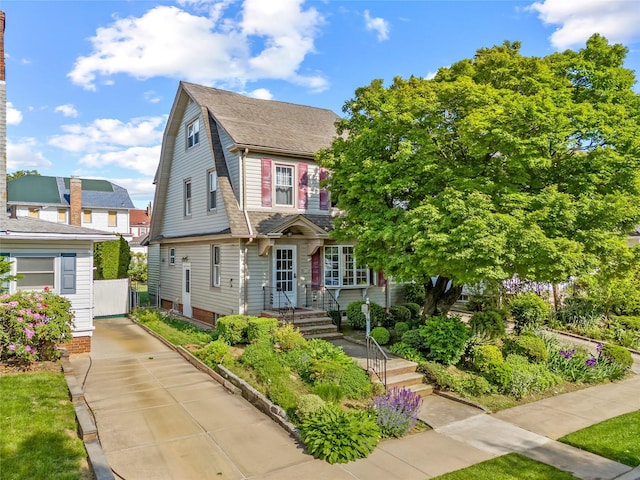 45-31 169th St, Flushing, NY 11358 - view of front facade with roof with shingles