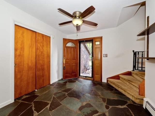 3 Brookland Farms Rd, Poughkeepsie, NY 12601 - foyer entrance featuring a baseboard radiator, stone flooring, stairway, baseboards, and ceiling fan
