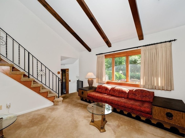 3 Brookland Farms Rd, Poughkeepsie, NY 12601 - carpeted living area with beam ceiling, stairway, and high vaulted ceiling
